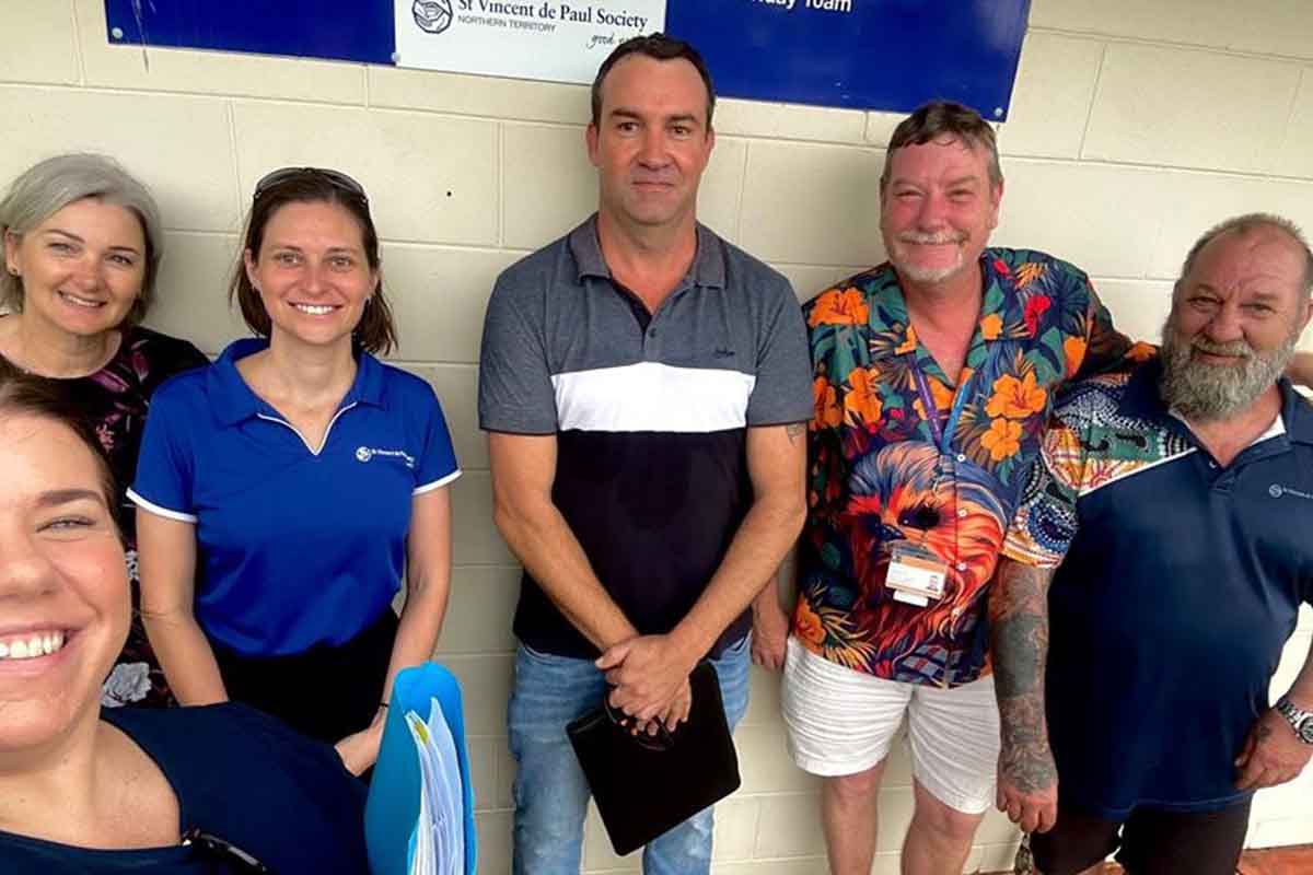 A group photo taken at housing complex in Katherine